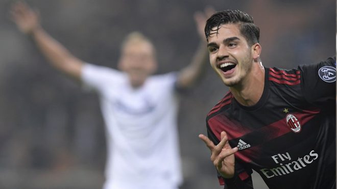 AC Milan's Portuguese forward Andre Silva celebrates after scoring during the UEFA Europa League group D football match between AC Milan and FK Austria-Wiendur at the San Siro stadium in Milan on November 23, 2017. MIGUEL MEDINA / AFP