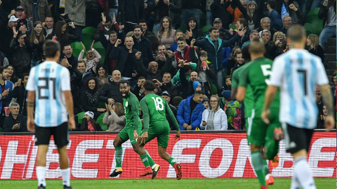 Nigeria's Brown Ideye (L) celebrates after scoring the team's third goal during an international friendly football match between Argentina and Nigeria in Krasnodar on November 14, 2017. Mladen ANTONOV / AFP