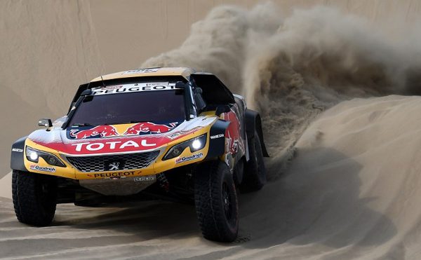 Peugeot's driver Stephane Peterhansel and his co-driver Jean Paul Cottret of France compete during Stage 3 of the Dakar 2018 between Pisco and San Juan de Marcona, Peru, on January 8, 2018. FRANCK FIFE / AFP