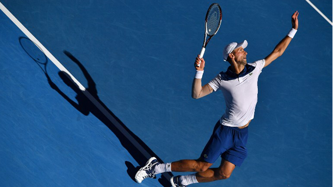 Serbia's Novak Djokovic serves against Donald Young of the US during their men's singles first round match on day two of the Australian Open tennis tournament in Melbourne on January 16, 2018. Greg Wood / AFP