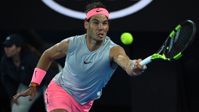 Spain's Rafael Nadal plays a forehand return to Croatia's Marin Cilic during their men's singles quarter-finals match on day nine of the Australian Open tennis tournament in Melbourne on January 23, 2018. WILLIAM WEST / AFP