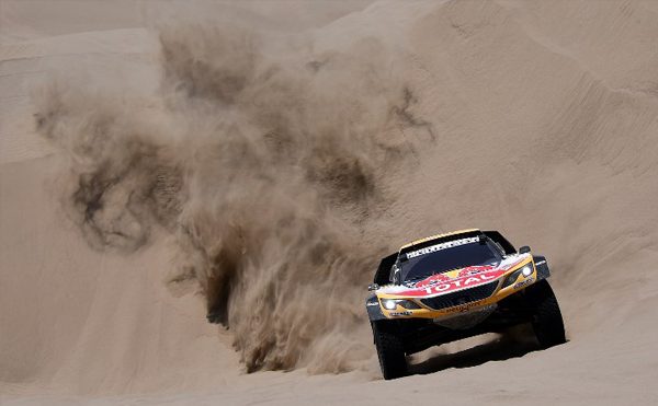 Peugeot's driver Stephane Peterhansel and his co-driver Jean Paul Cottret of France, compete during the Stage 4 of the 2018 Dakar Rally in and around San Juan de Marcona, Peru, on January 9, 2018. FRANCK FIFE / AFP