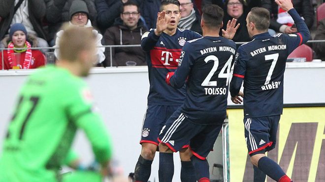 Munich's Colombian midfielder James Rodriguez (L) celebrates with teammates after scoring during the German first division Bundesliga football match Mainz 05 versus Bayern Munich on February 3, 2018 in Mainz. Daniel ROLAND / AFP