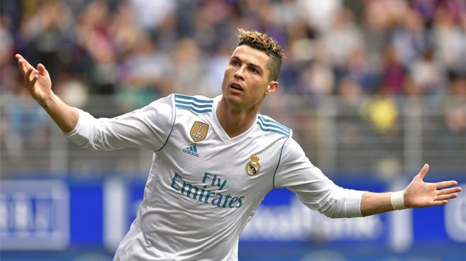Real Madrid's Portuguese forward Cristiano Ronaldo celebrates after scoring a goal during the Spanish league football match between Eibar and Real Madrid at the Ipurua stadium in Eibar on March 10, 2018. ANDER GILLENEA / AFP