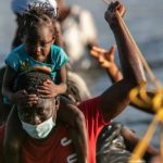 5 claves para entender por qué están llegando miles de haitianos a Estados Unidos (y por qué la mayoría no viene directamente de Haití)