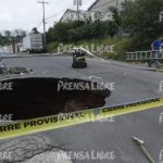 Las imágenes del socavón en plena vía de Mixco debido a las fuertes lluvias