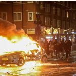 Imágenes: vehículos incendiados, gases lacrimógenos y decenas de arrestos tras disturbios por victoria de Marruecos contra Bélgica en Qatar